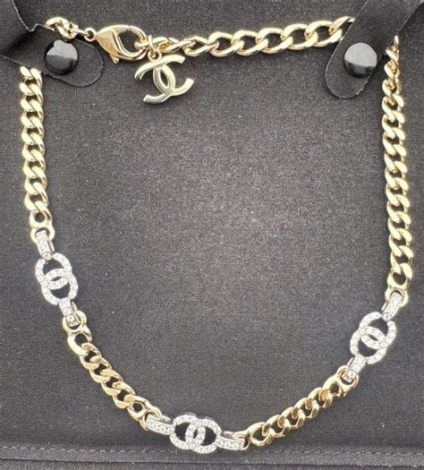 fake chanel logo necklace|authentic Chanel counterfeit.